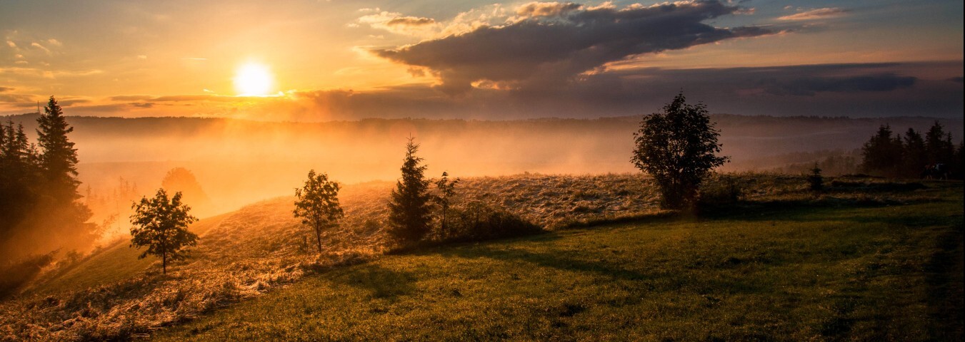 Landschaft bei Sonnenuntergang